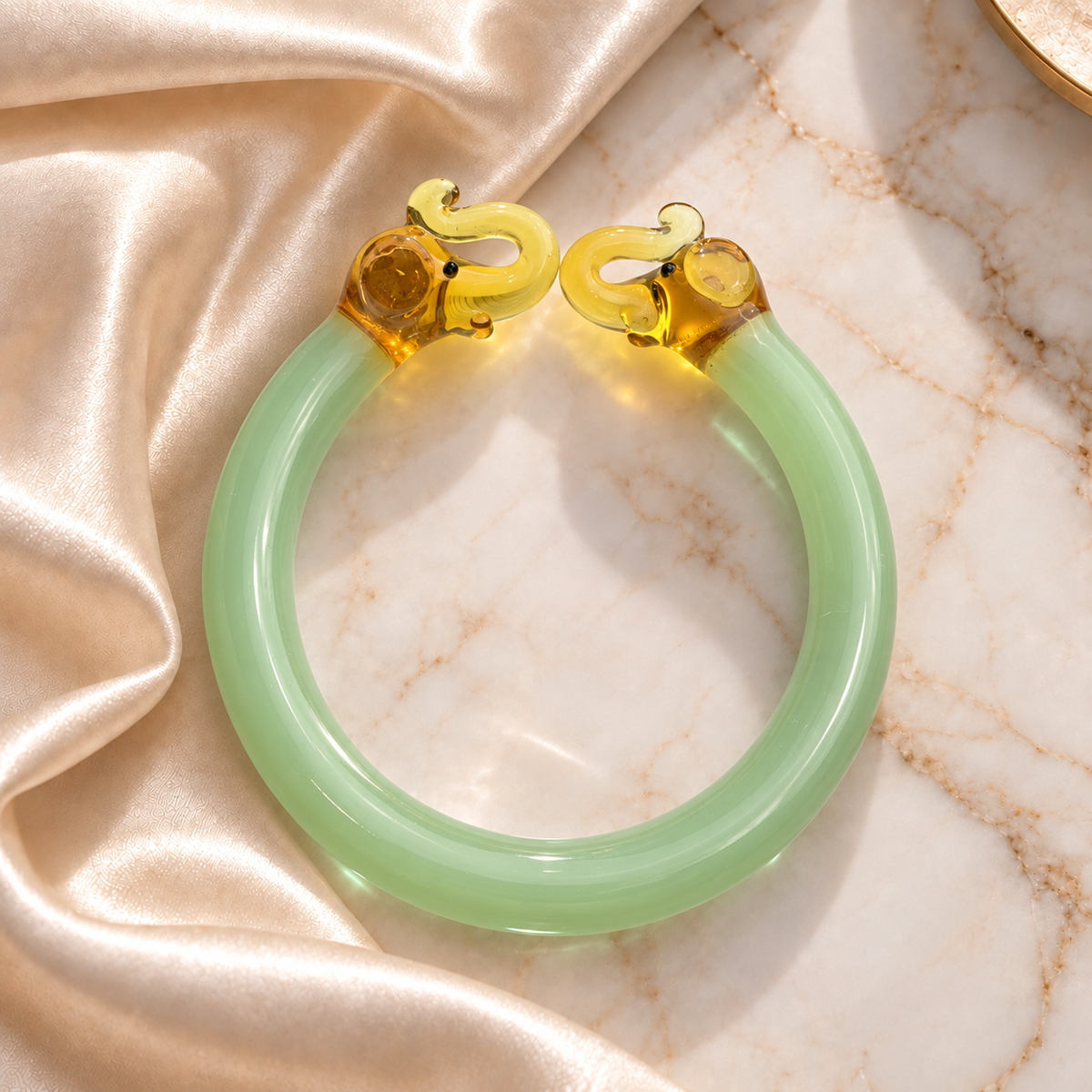Glass Bracelet with Golden Elephant Design