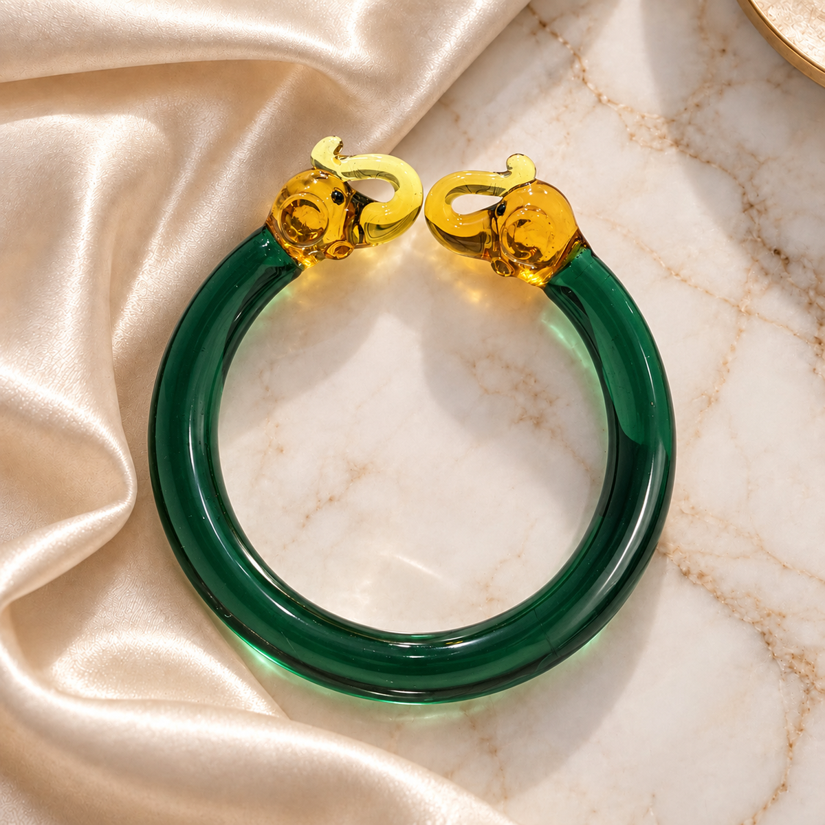 Glass Bracelet with Golden Elephant Design