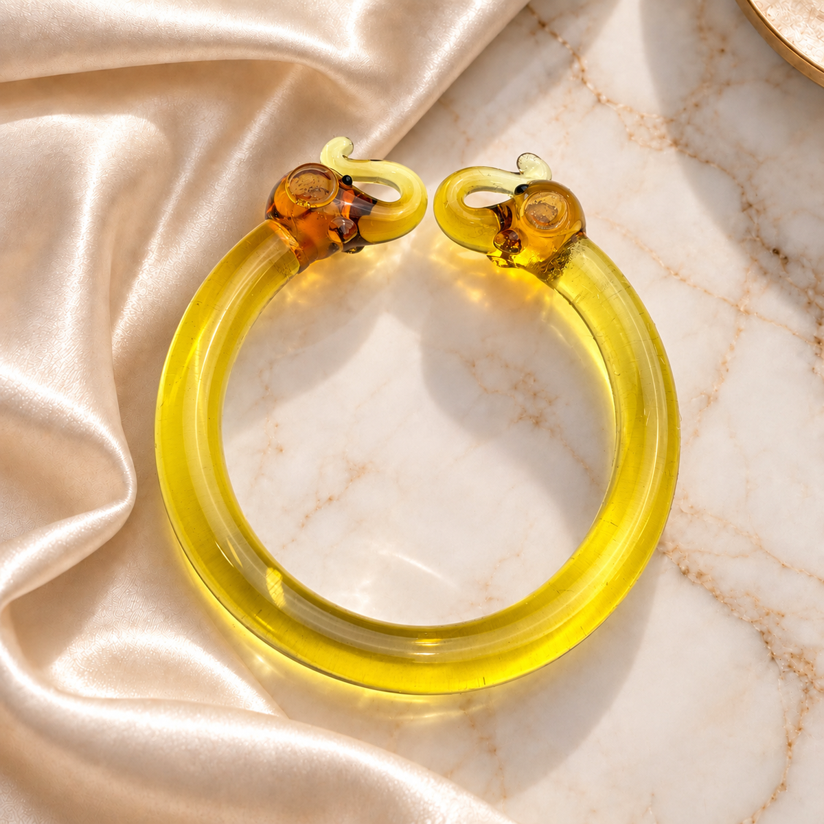 Glass Bracelet with Golden Elephant Design