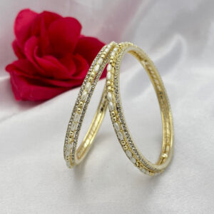 Elegant Gold Polish Oval Pearl & Zircon Bangles